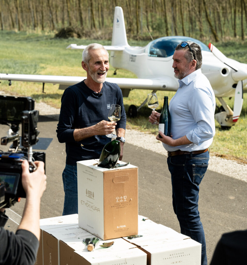 Péter Besenyei pilot and Sándor Mérész chief winemaker after the sabrage